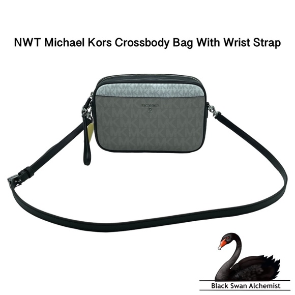 Michael Kors Handbags - NWT Michael Kors Jet Set Charm Large East/West Crossbody Bag